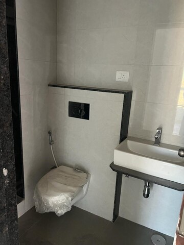 Bathroom in 2 BHK Apartment at Sheth Auris Serenity Tower 2, Malad West – for Sale