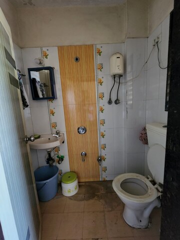 Bathroom in 2 BHK Apartment at Shantinath Darshan CHS Dahisar, Dahisar East – for Sale