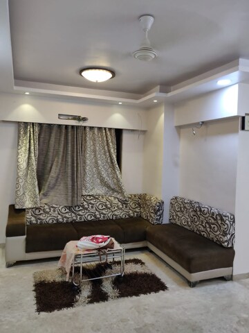 Living Room in 2 BHK Apartment at Shri Balaji Ashirwad, Malad West – for Rent