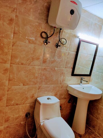 Bathroom in Studio Apartment at Supertech Czar Suites, Omicron I Greater Noida – for Rent