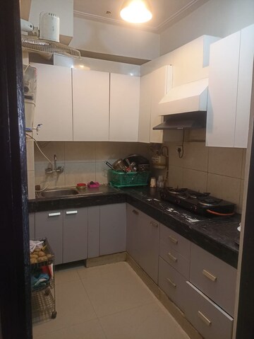 Kitchen in 2 BHK Apartment at Nitishree Aura Chimera, Raj Nagar Extension – for Sale