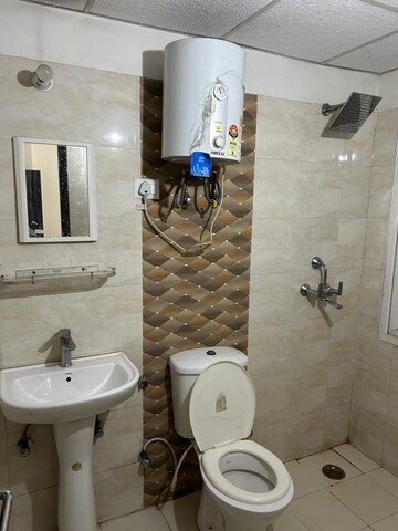 Bathroom in 2 BHK Apartment at Antriksh Golf View, Sector 78 – for Rent