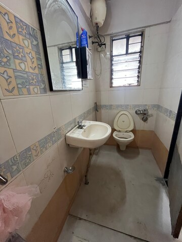 Bathroom in 2 BHK Apartment at Magarpatta City Cosmos, Magarpatta Road – for Rent