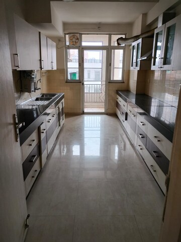 Kitchen in 4 BHK Apartment at DLF The Summit, Dlf Phase V – for Rent
