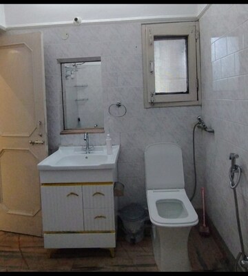 Bathroom in 2 BHK Builder Floor at Madhya Marg – for Rent