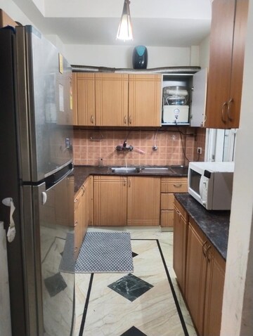 Kitchen in 2 BHK Apartment at Mahagun Maestro, Sector 50 – for Rent