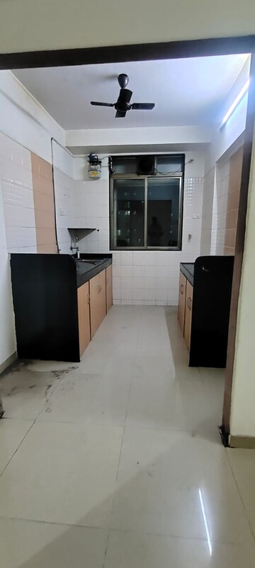Kitchen in 2 BHK Apartment at Raj Paradise B Wing CHS Ltd, Andheri East – for Rent