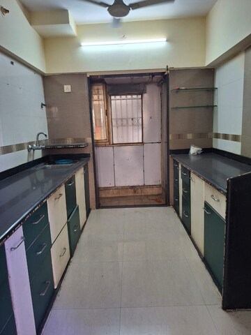 Kitchen in 3 BHK Apartment at Regency Estate, Dombivli East – for Rent