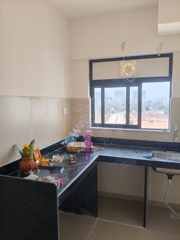 Kitchen in 2 BHK Apartment at Runwal Gardens, Dombivli East – for Rent