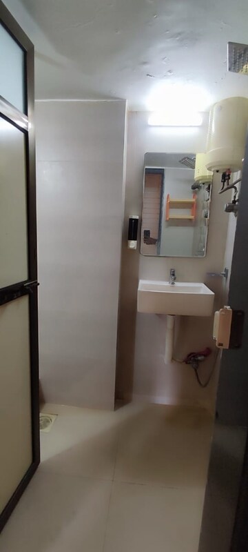 Bathroom in 1 BHK Apartment at Kshitij CHS, Goregaon East – for Rent
