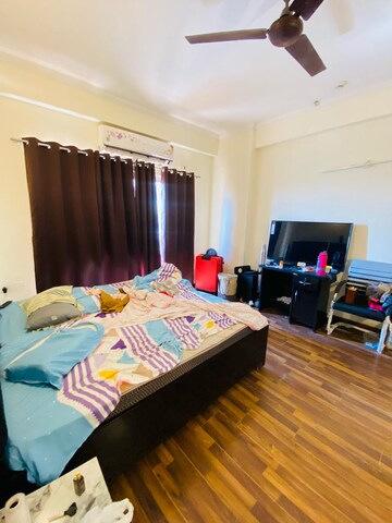 Bedroom in 2.5 BHK Apartment at Aims Golf City, Sector 75 – for Rent