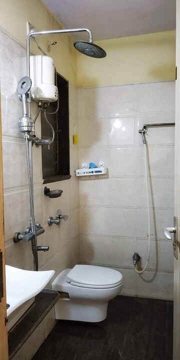 Bathroom in 1 BHK Apartment at Sejal Park Society, Dahisar East – for Rent