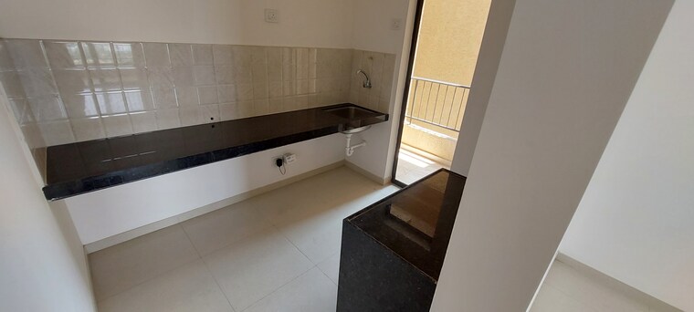 Kitchen, shapoorji-pallonji-joyville-hadapsar-annexe 2 Bedroom 619 Sq.Ft. Apartment In Hadapsar Pune 8440035