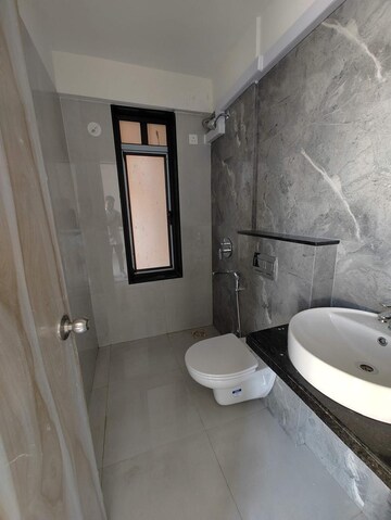 Bathroom in 2 BHK Apartment at MICL Aaradhya Highpark, Mira Road – for Sale