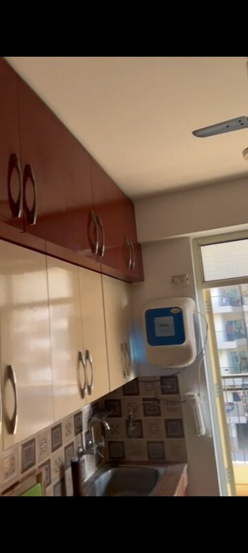 Kitchen in 3 BHK Apartment at Uninav Heights Phase I, Raj Nagar Extension – for Rent