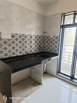 Kitchen in 2 BHK Apartment at Sanghvi Ecocity, Mahajanwadi – for Sale