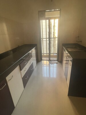 Kitchen in 2 BHK Apartment at Lodha Aqua, Mira Road – for Sale
