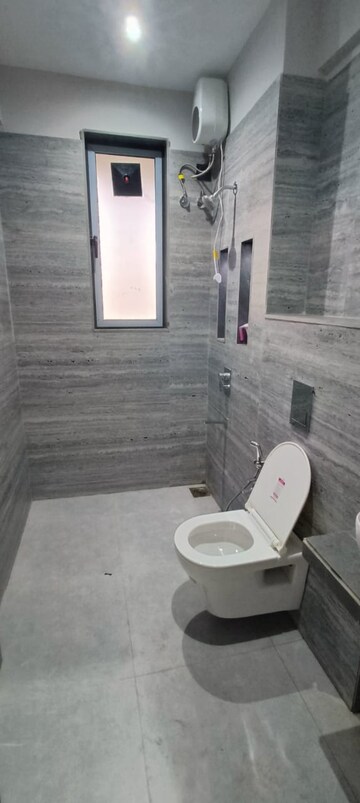 Bathroom in 2 BHK Apartment at Rishabraj Blue Lotus, Khar West – for Rent