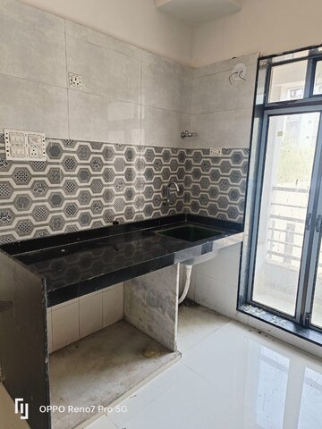 Kitchen in 1 BHK Apartment at Sanghvi Ecocity Woods, Mahajanwadi – for Rent