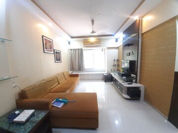 Living Room in 2 BHK Apartment at Riddhi Garden, Malad East – for Rent