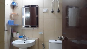 Bathroom in 3 BHK Apartment at Mahagun Mywoods, Sector 16c Greater Noida – for Rent