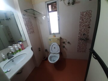 Bathroom in 2 BHK Apartment at Riddhi Gardens CHS, Malad East – for Rent