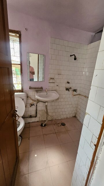 Bathroom in 2 BHK Builder Floor at Govindpuri – for Rent