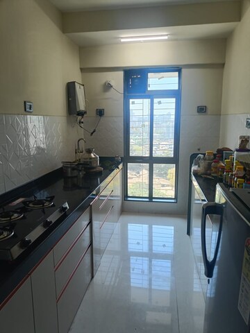 Kitchen in 2 BHK Apartment at Shiv Shakti Tower 28, Malad East – for Rent