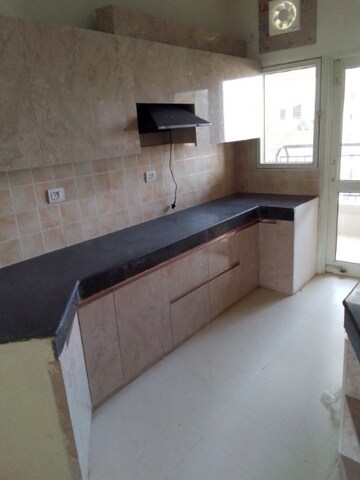 Kitchen in 3 BHK Apartment at Ramprastha Awho, Sector 95 – for Rent