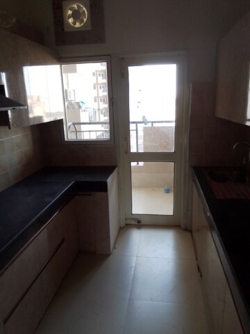 Kitchen in 3 BHK Apartment at Ramprastha Awho, Sector 95 – for Rent