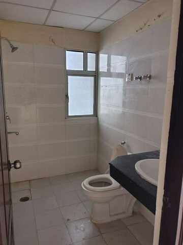 Bathroom in 2 BHK Apartment at Ajnara Integrity, Raj Nagar Extension – for Rent