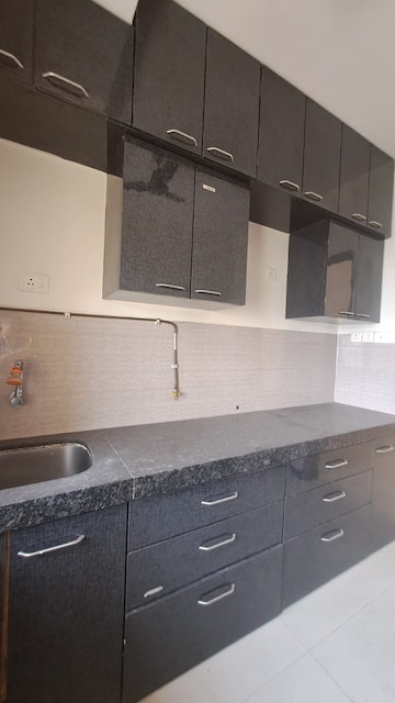 Kitchen in 2 BHK Apartment at Acme Ozone, Manpada – for Sale