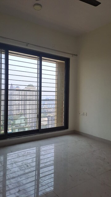 Room in 2 BHK Apartment at Acme Ozone, Manpada – for Sale