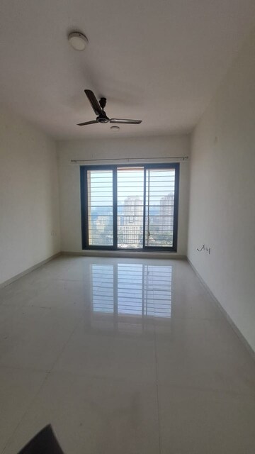 Room in 2 BHK Apartment at Acme Ozone, Manpada – for Sale