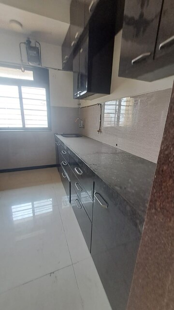 Kitchen in 2 BHK Apartment at Acme Ozone, Manpada – for Sale