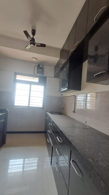 Kitchen in 2 BHK Apartment at Acme Ozone, Manpada – for Sale