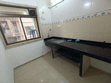Kitchen in 1 BHK Apartment at Sai Raj Darshan, Kopar Khairane – for Sale