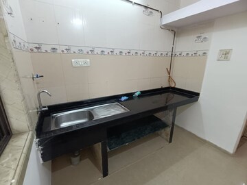 Kitchen in 1 BHK Apartment at Sai Raj Darshan, Kopar Khairane – for Sale