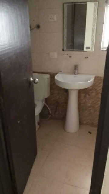 Bathroom in 2 BHK Apartment at Nitishree Aura Chimera, Raj Nagar Extension – for Rent