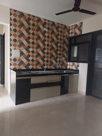 Kitchen in 2 BHK Apartment at Magarpatta Nanded City Sargam, Sinhagad – for Rent