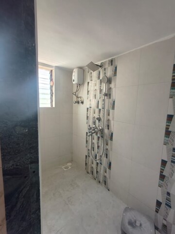 Bathroom in 1 BHK Apartment at Andheri CHS, Andheri West – for Rent