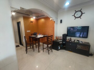 Living Room in 2 BHK Apartment at Planet Powai CHS, Powai – for Rent