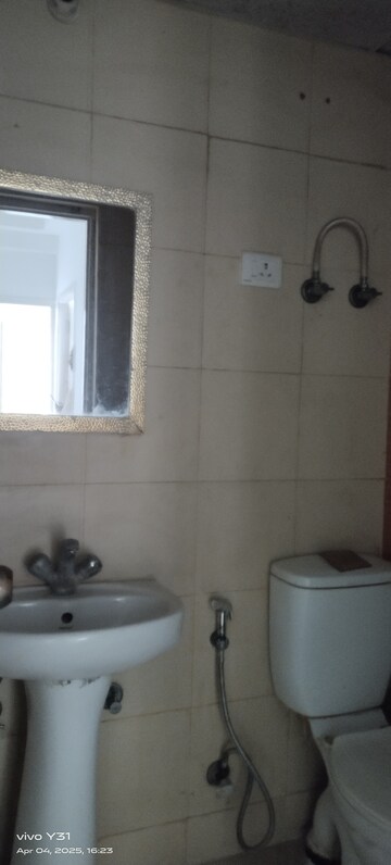 Bathroom in 2.5 BHK Apartment at Mahagun Mywoods, Sector 16c Greater Noida – for Rent