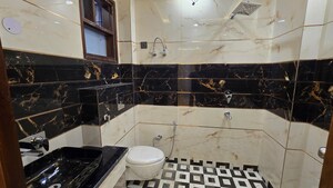 Bathroom in 3 BHK Builder Floor at Rajouri Garden – for Sale