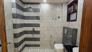 Bathroom in 3 BHK Builder Floor at Rajouri Garden – for Sale