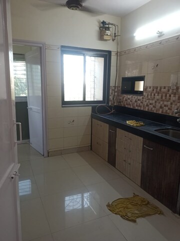 Kitchen in 2 BHK Apartment at Shree Vaishno Neelkanth Apartment, Malad East – for Rent