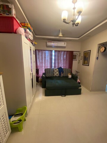 Living Room in 1 BHK Apartment at Gurukrupa Marina Enclave, Malad West – for Rent