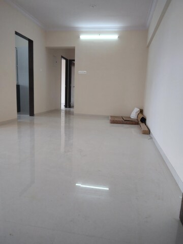 Living Room in 2 BHK Apartment at Asmita Sand Dunes, Malad West – for Rent