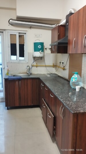 Kitchen in 1.5 BHK Apartment at Aditya Celebrity Homes, Sector 76 – for Sale