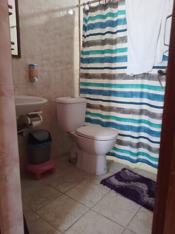 Bathroom in 2 BHK Apartment at Kolte Patil Rose Parade, Nibm – for Sale